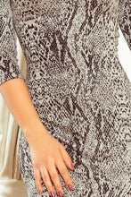 Load image into Gallery viewer, Numoco 88-18 Dress with a sleeve and a trapezoidal skirt - snake skin
